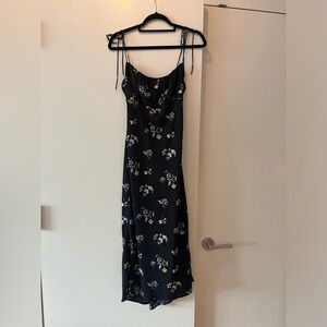 Black Abercrombie Dress with flowered and side leg slit.